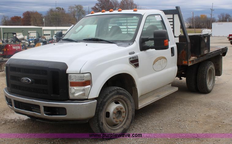 image for item J4583 2008 Ford F350 Super Duty flatbed pickup truck