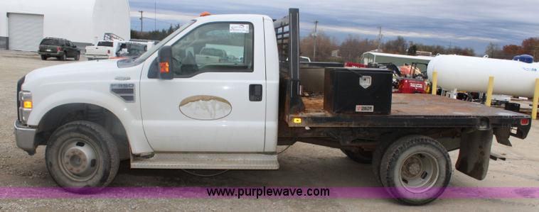 image for item J4583 2008 Ford F350 Super Duty flatbed pickup truck