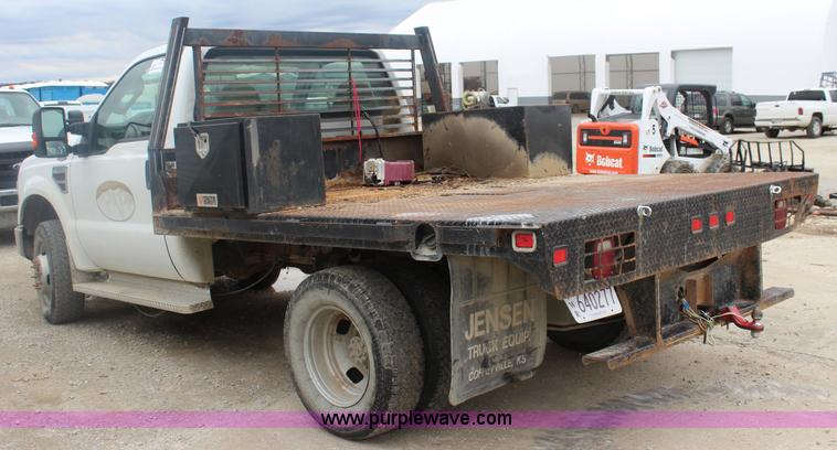 image for item J4583 2008 Ford F350 Super Duty flatbed pickup truck