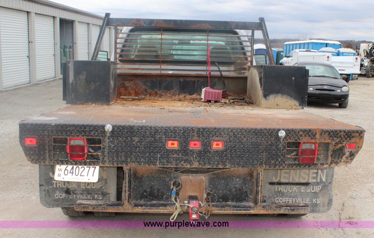 image for item J4583 2008 Ford F350 Super Duty flatbed pickup truck