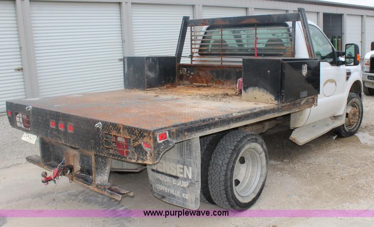 image for item J4583 2008 Ford F350 Super Duty flatbed pickup truck