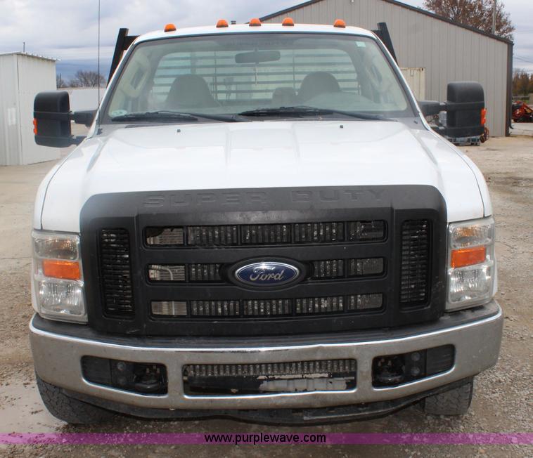 image for item J4583 2008 Ford F350 Super Duty flatbed pickup truck