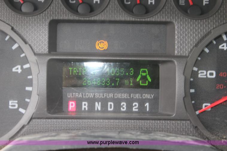 image for item J4583 2008 Ford F350 Super Duty flatbed pickup truck