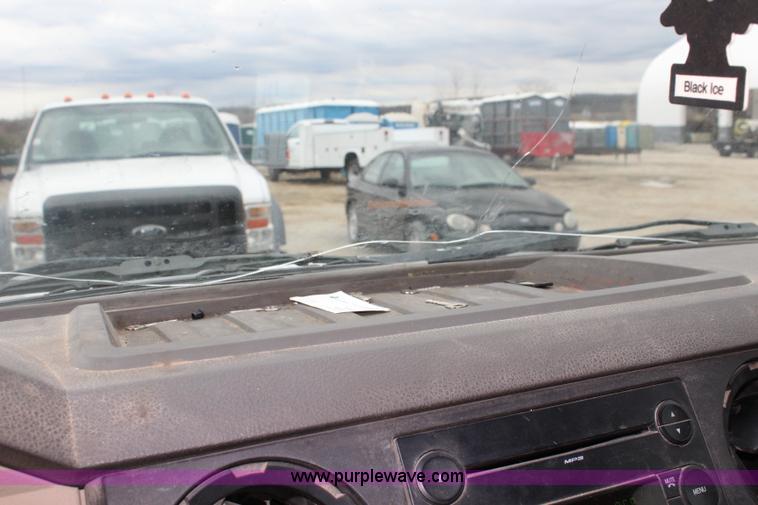 image for item J4583 2008 Ford F350 Super Duty flatbed pickup truck