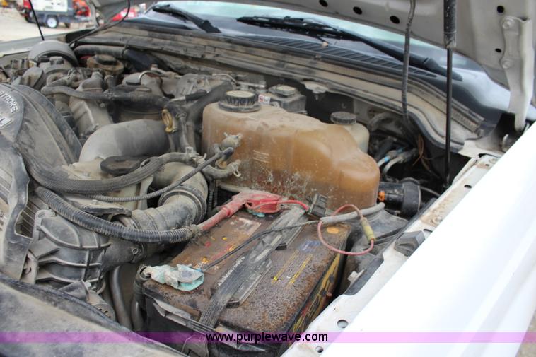 image for item J4583 2008 Ford F350 Super Duty flatbed pickup truck