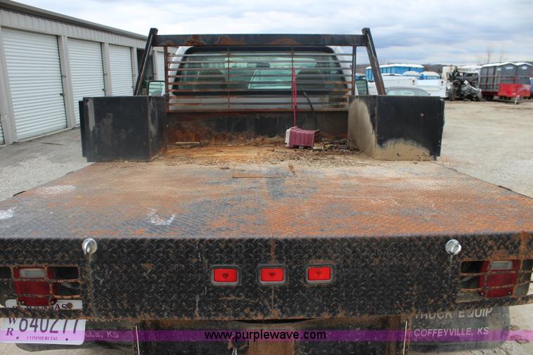 image for item J4583 2008 Ford F350 Super Duty flatbed pickup truck