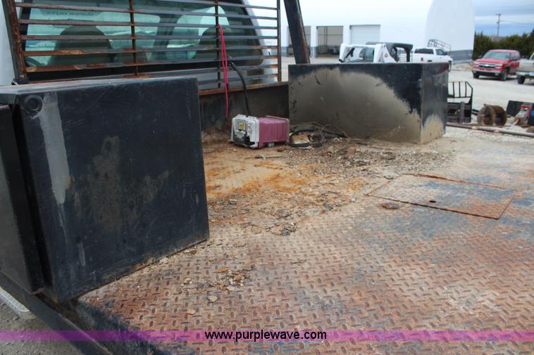 image for item J4583 2008 Ford F350 Super Duty flatbed pickup truck