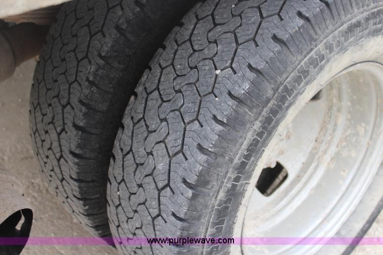 image for item J4583 2008 Ford F350 Super Duty flatbed pickup truck