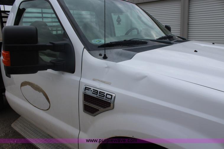 image for item J4583 2008 Ford F350 Super Duty flatbed pickup truck