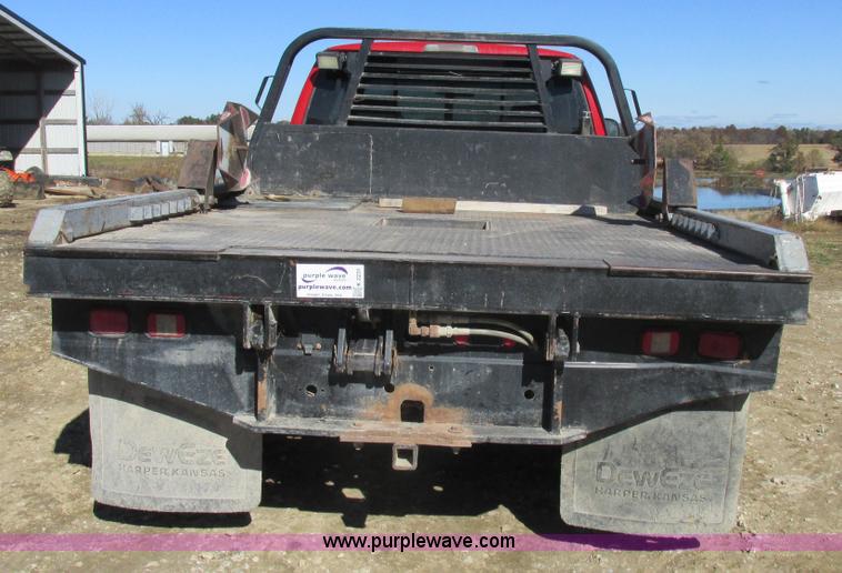 image for item K2231 2001 Dodge Ram 3500 Quad Cab flatbed pickup truck