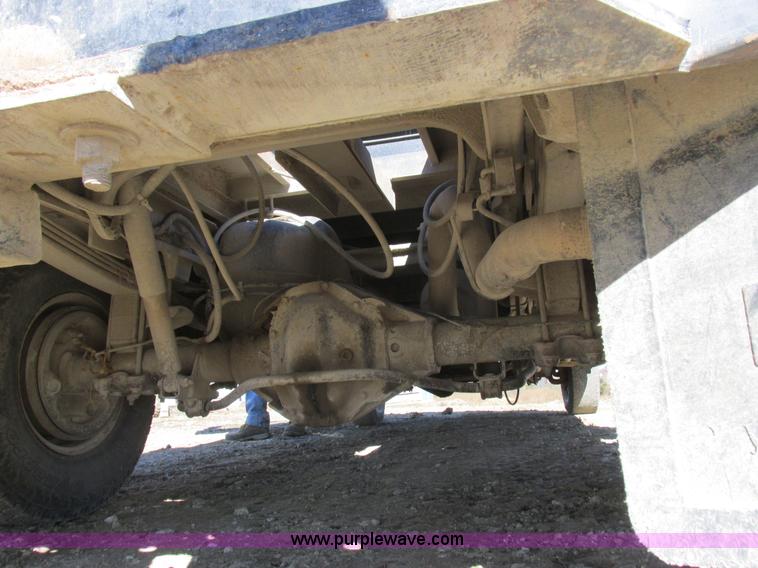 image for item K2231 2001 Dodge Ram 3500 Quad Cab flatbed pickup truck