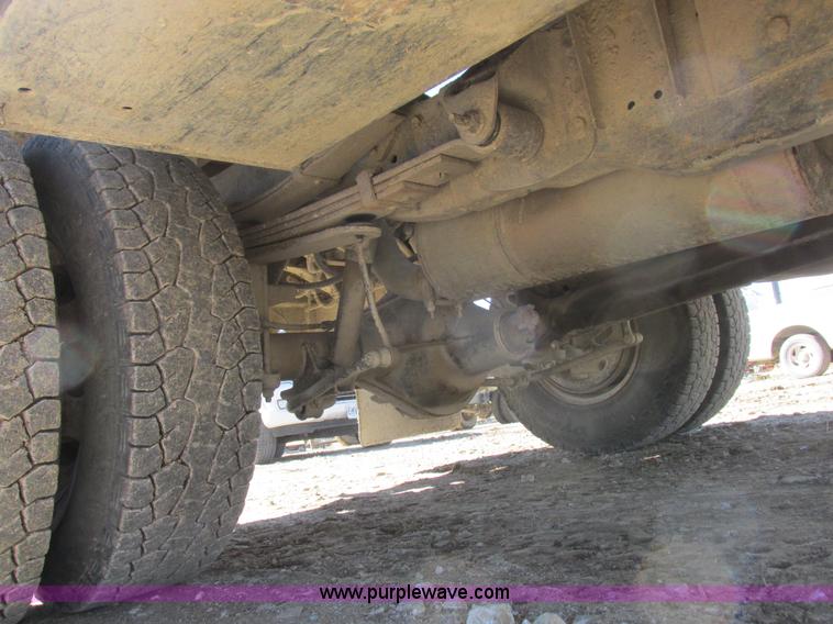 image for item K2231 2001 Dodge Ram 3500 Quad Cab flatbed pickup truck