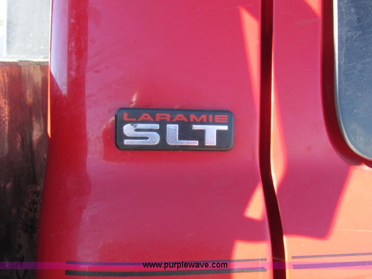 image for item K2231 2001 Dodge Ram 3500 Quad Cab flatbed pickup truck