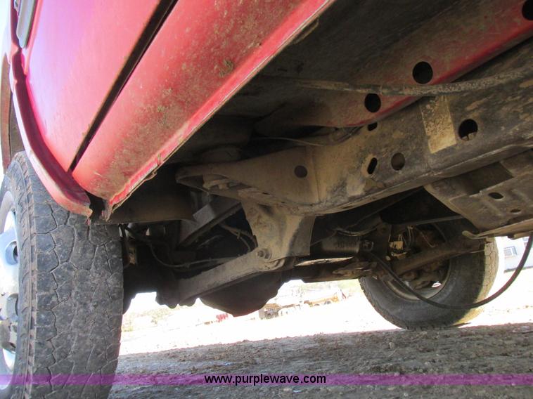 image for item K2231 2001 Dodge Ram 3500 Quad Cab flatbed pickup truck