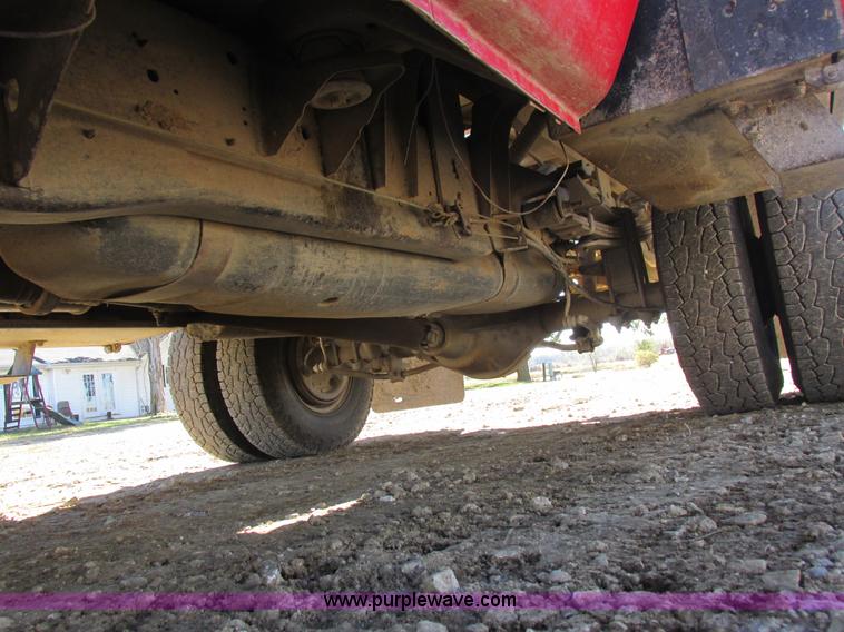 image for item K2231 2001 Dodge Ram 3500 Quad Cab flatbed pickup truck