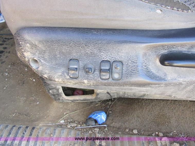 image for item K2231 2001 Dodge Ram 3500 Quad Cab flatbed pickup truck