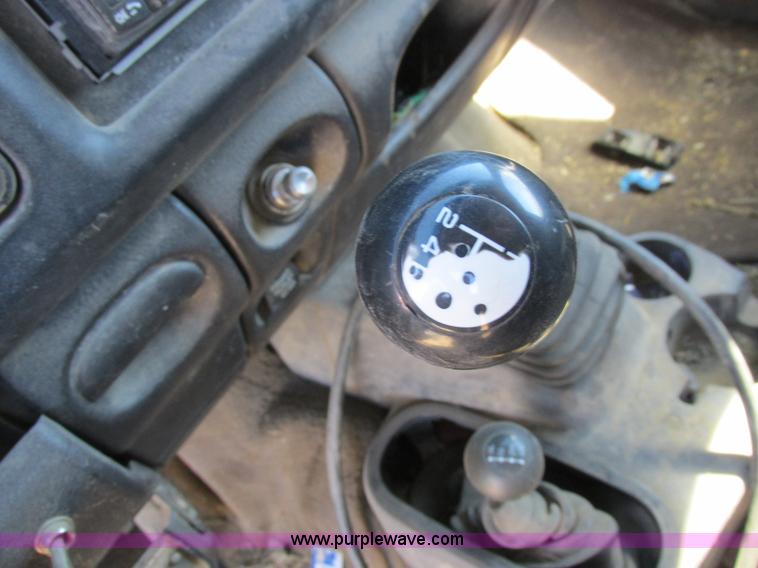 image for item K2231 2001 Dodge Ram 3500 Quad Cab flatbed pickup truck