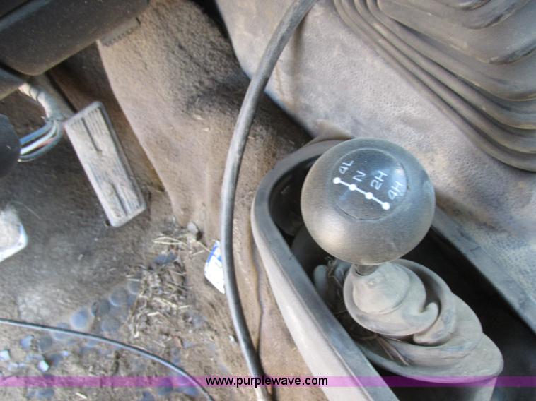 image for item K2231 2001 Dodge Ram 3500 Quad Cab flatbed pickup truck