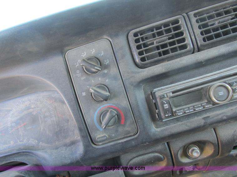 image for item K2231 2001 Dodge Ram 3500 Quad Cab flatbed pickup truck