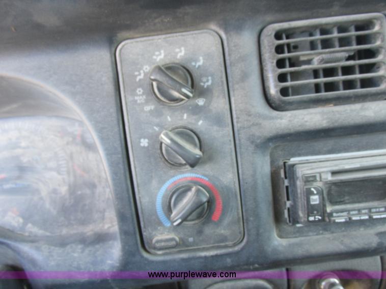 image for item K2231 2001 Dodge Ram 3500 Quad Cab flatbed pickup truck