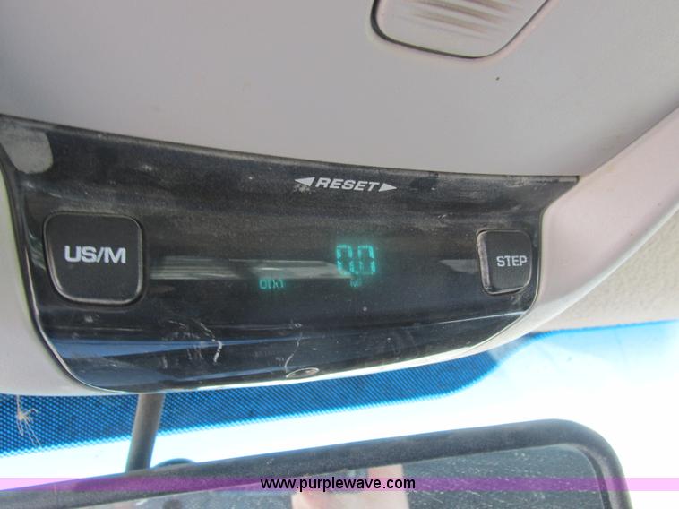 image for item K2231 2001 Dodge Ram 3500 Quad Cab flatbed pickup truck