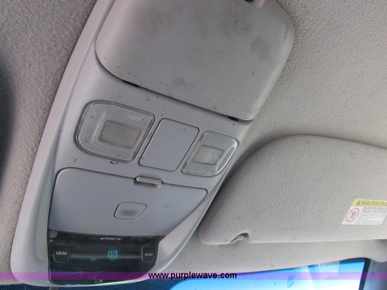 image for item K2231 2001 Dodge Ram 3500 Quad Cab flatbed pickup truck