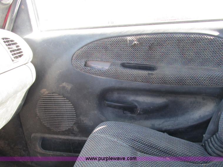 image for item K2231 2001 Dodge Ram 3500 Quad Cab flatbed pickup truck