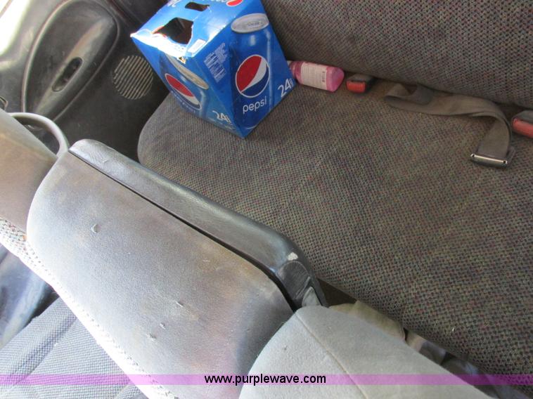 image for item K2231 2001 Dodge Ram 3500 Quad Cab flatbed pickup truck