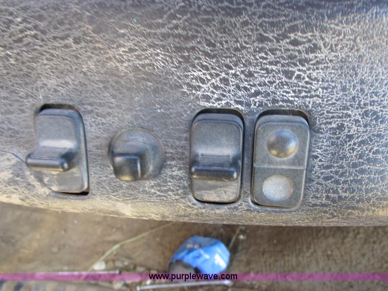 image for item K2231 2001 Dodge Ram 3500 Quad Cab flatbed pickup truck