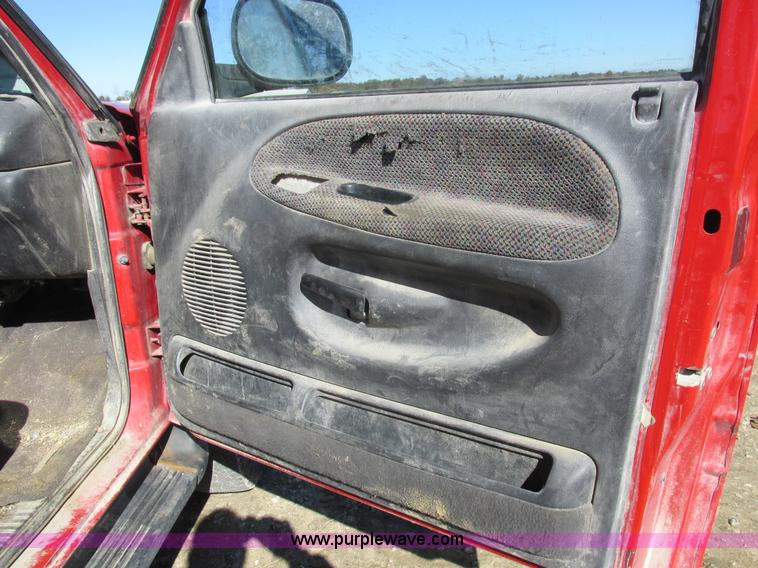 image for item K2231 2001 Dodge Ram 3500 Quad Cab flatbed pickup truck