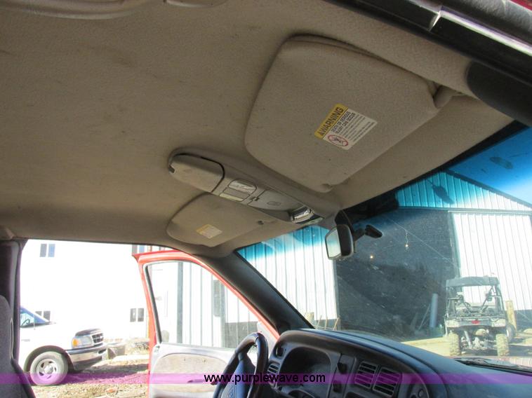 image for item K2231 2001 Dodge Ram 3500 Quad Cab flatbed pickup truck