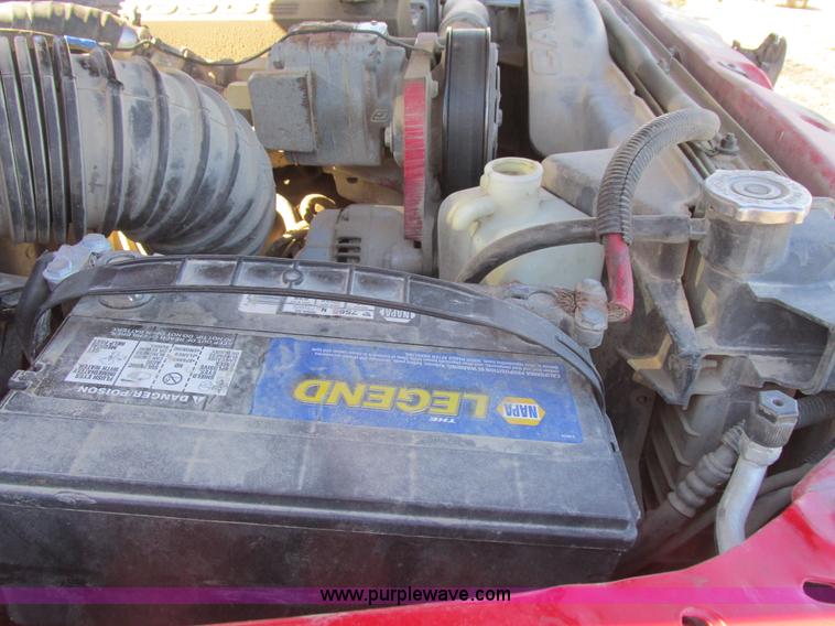 image for item K2231 2001 Dodge Ram 3500 Quad Cab flatbed pickup truck