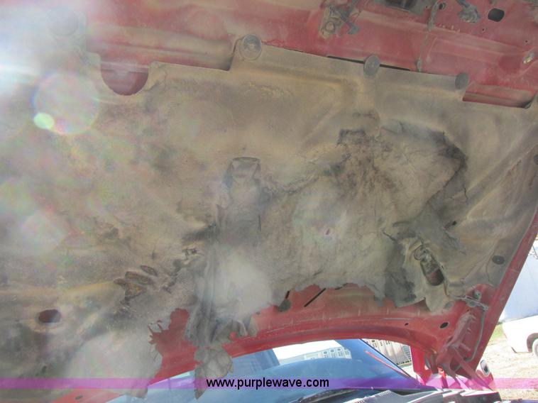 image for item K2231 2001 Dodge Ram 3500 Quad Cab flatbed pickup truck