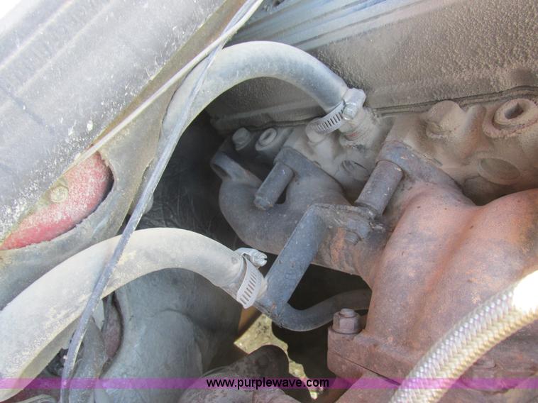 image for item K2231 2001 Dodge Ram 3500 Quad Cab flatbed pickup truck