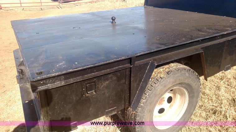 image for item L6033 2001 Dodge Ram 3500 Quad Cab flatbed pickup truck