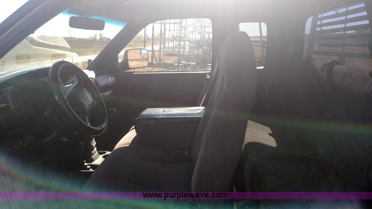 image for item L6033 2001 Dodge Ram 3500 Quad Cab flatbed pickup truck