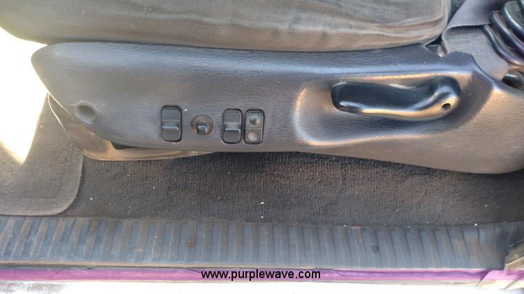 image for item L6033 2001 Dodge Ram 3500 Quad Cab flatbed pickup truck