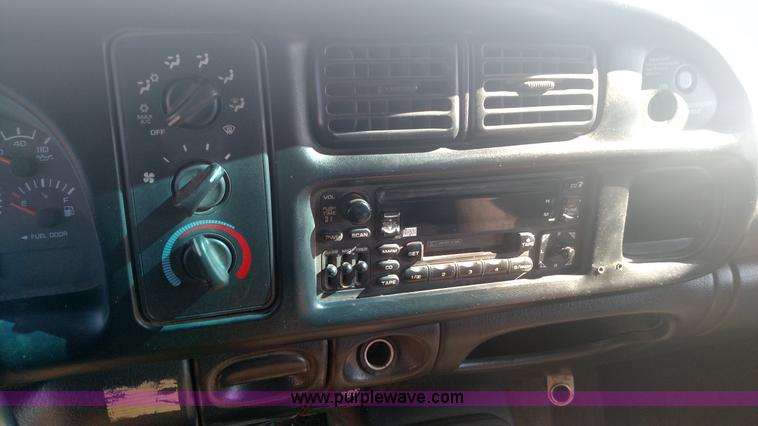 image for item L6033 2001 Dodge Ram 3500 Quad Cab flatbed pickup truck