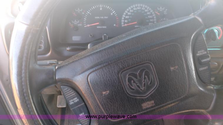 image for item L6033 2001 Dodge Ram 3500 Quad Cab flatbed pickup truck