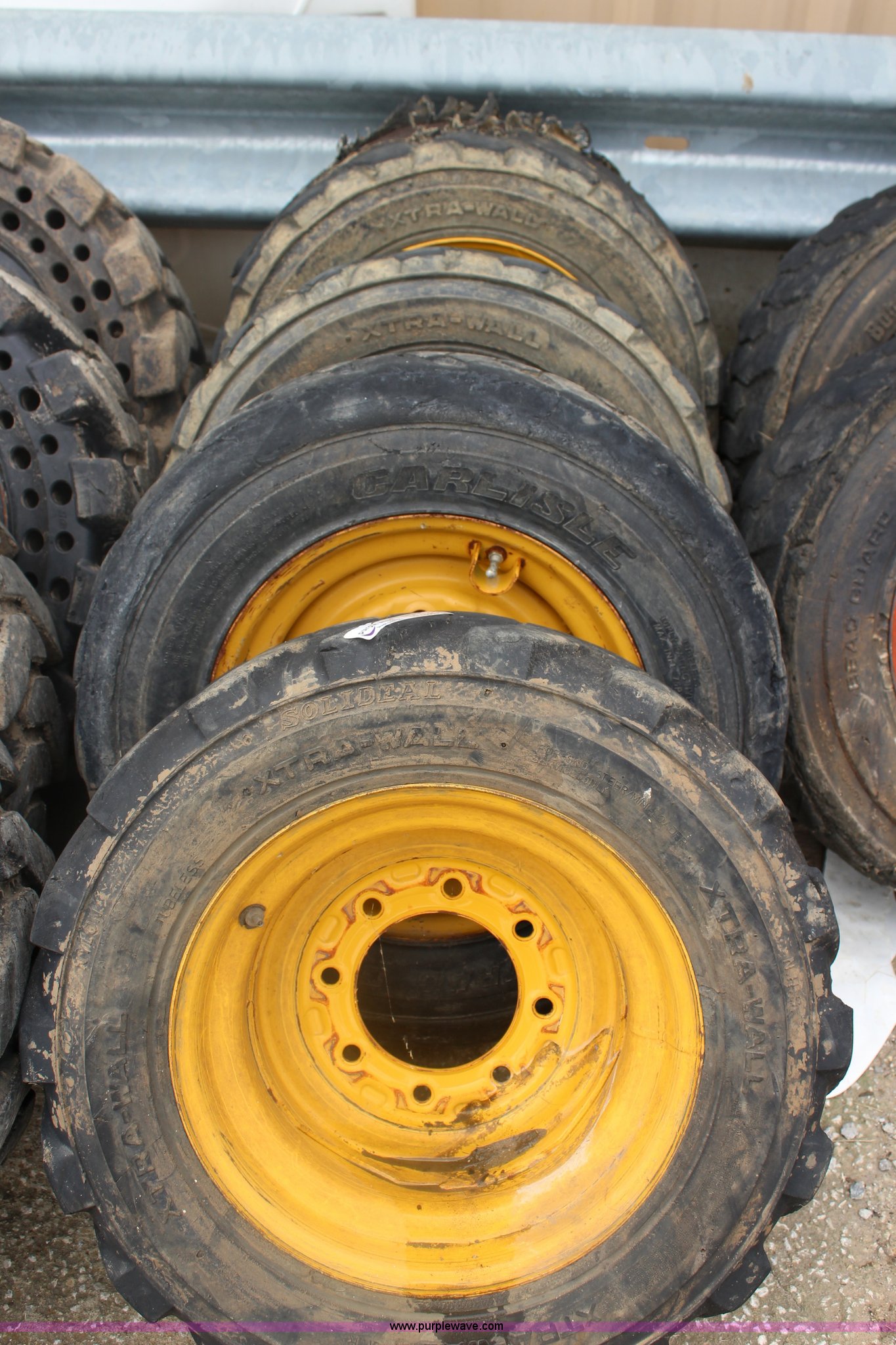 (4) John Deere 1016.5 foamfilled skid steer tires and wheels in Paola