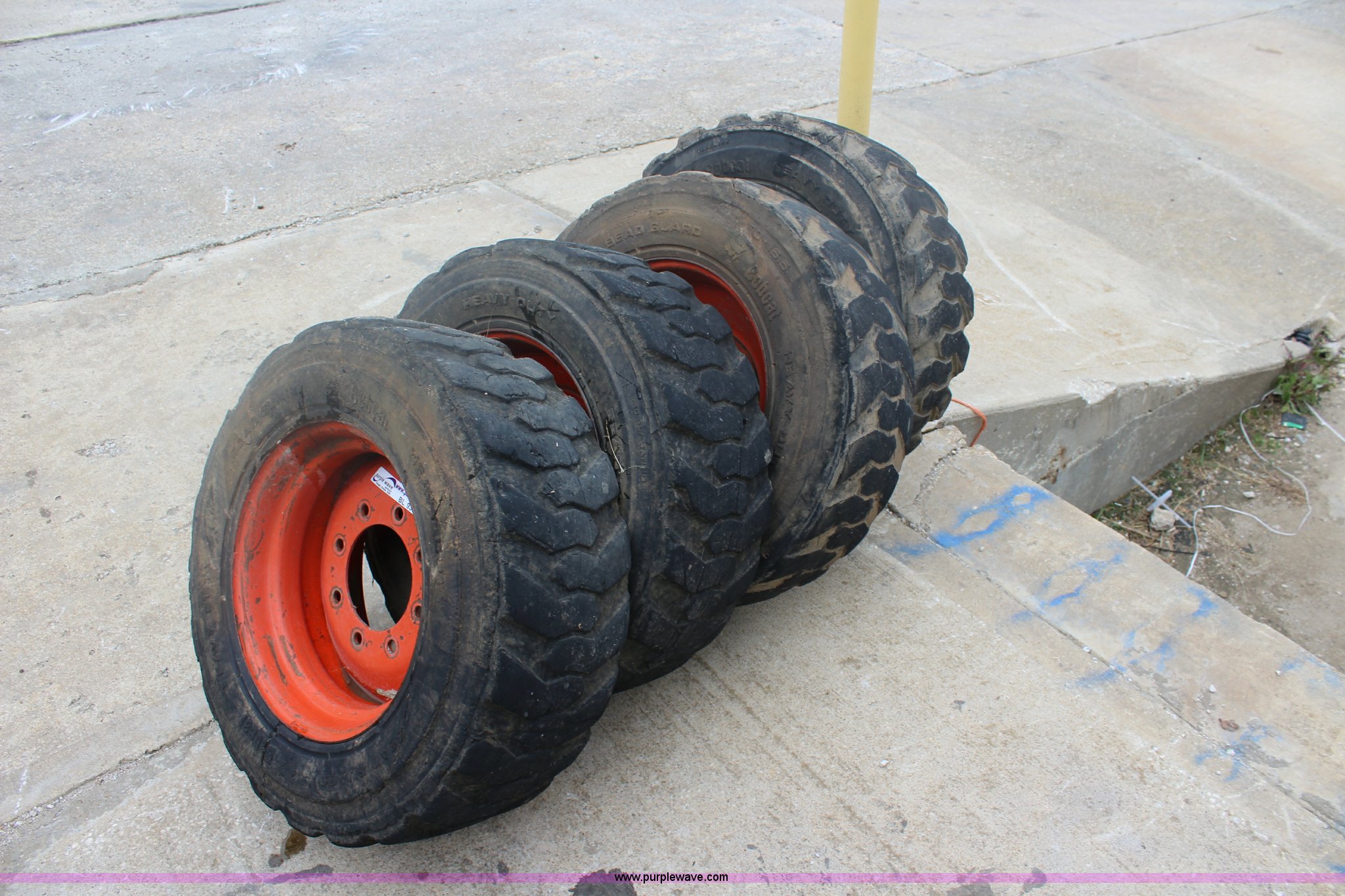 (4) Bobcat 1016.5 foamfilled skid steer tires and wheels in Paola, KS