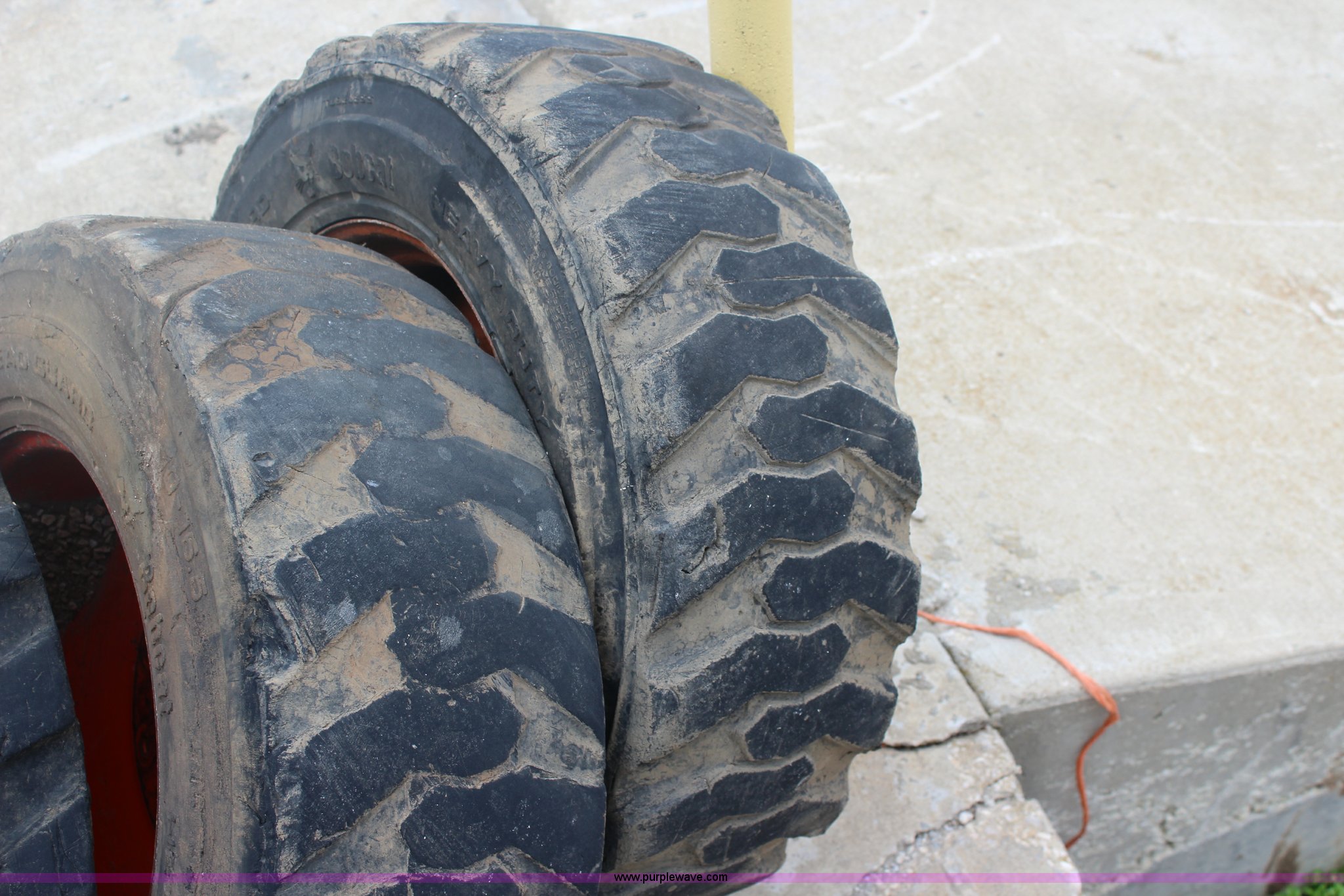 (4) Bobcat 1016.5 foamfilled skid steer tires and wheels in Paola, KS