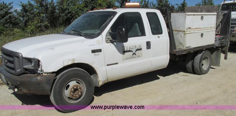 image for item BS9974 2000 Ford F350 Super Duty XL SuperCab flatbed pickup truck