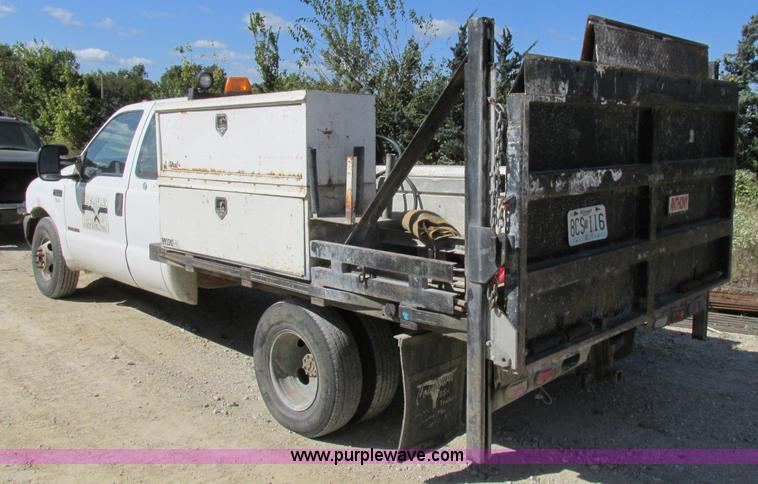 image for item BS9974 2000 Ford F350 Super Duty XL SuperCab flatbed pickup truck