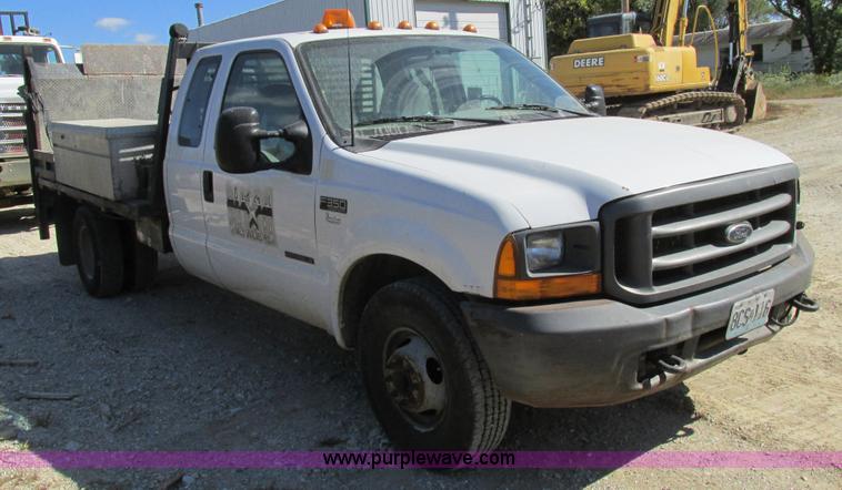 image for item BS9974 2000 Ford F350 Super Duty XL SuperCab flatbed pickup truck