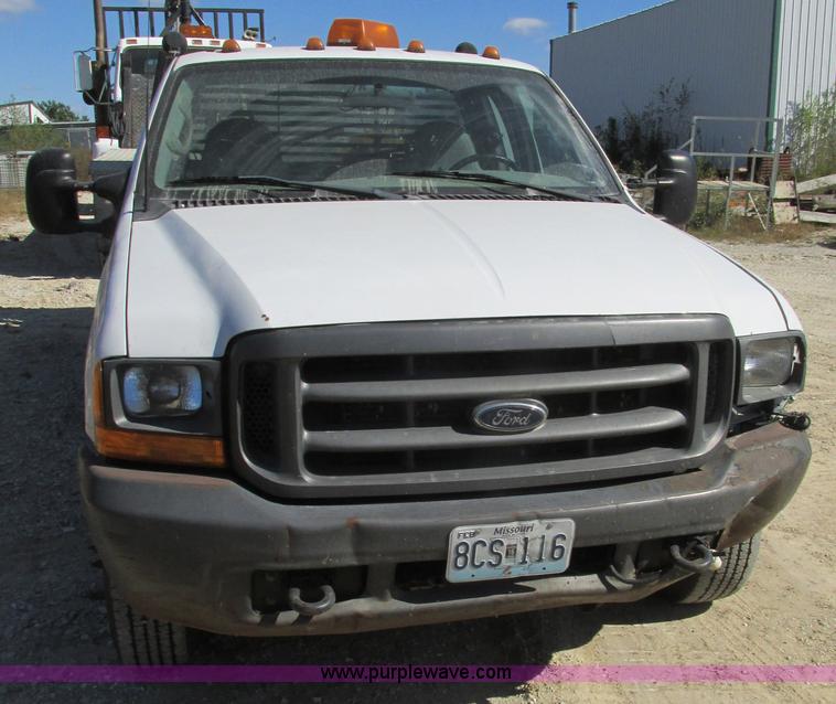 image for item BS9974 2000 Ford F350 Super Duty XL SuperCab flatbed pickup truck