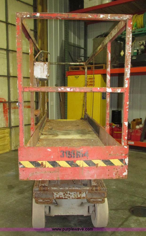 image for item H1030 1999 Skyjack SJIII 3220 scissor lift