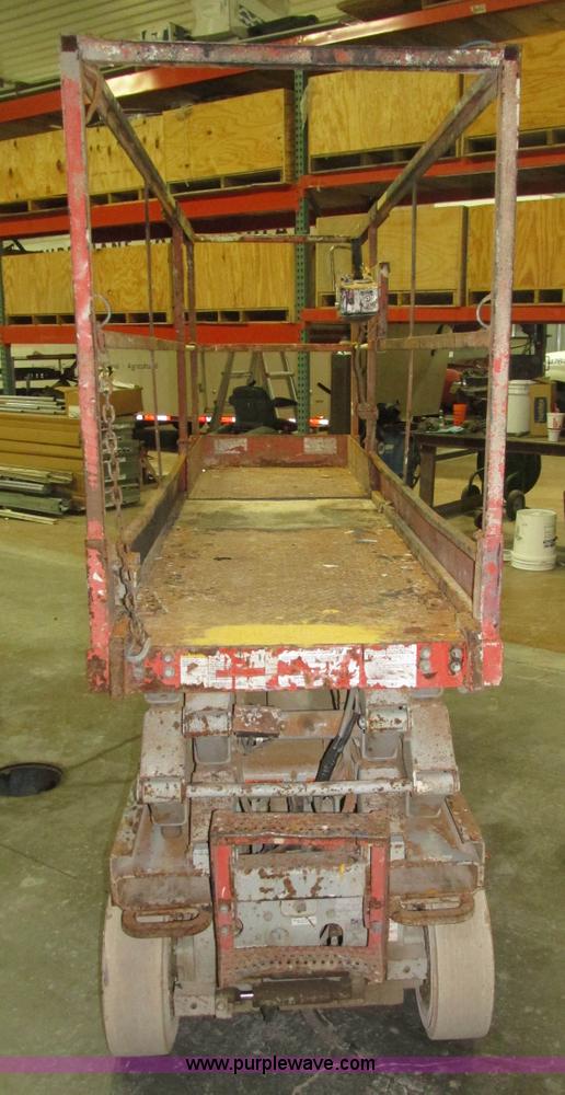 image for item H1030 1999 Skyjack SJIII 3220 scissor lift