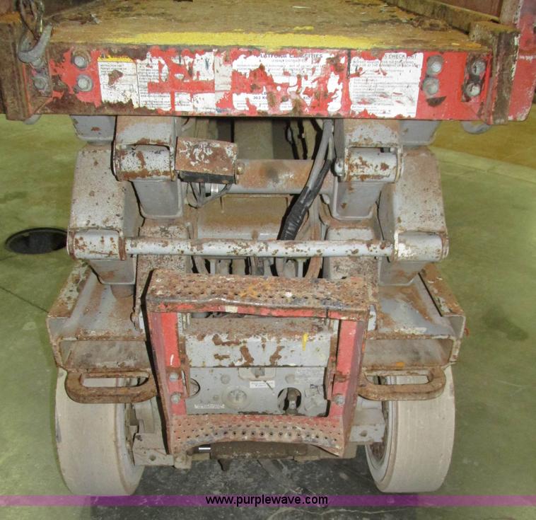 image for item H1030 1999 Skyjack SJIII 3220 scissor lift
