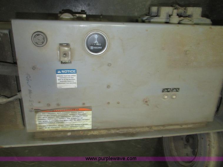 image for item H1030 1999 Skyjack SJIII 3220 scissor lift